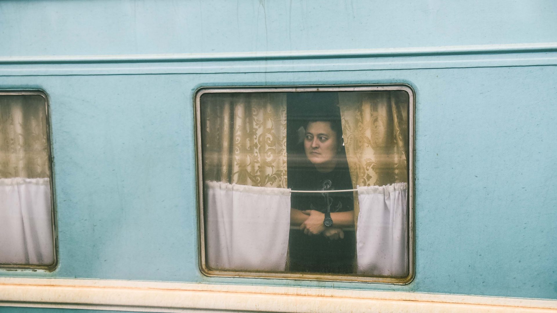 Writer Monisha Rajesh photographs a fellow passenger in Almaty, Kazakhstan.