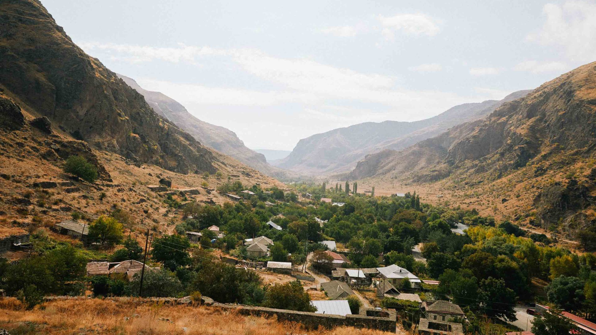 A village nestled in mountains.