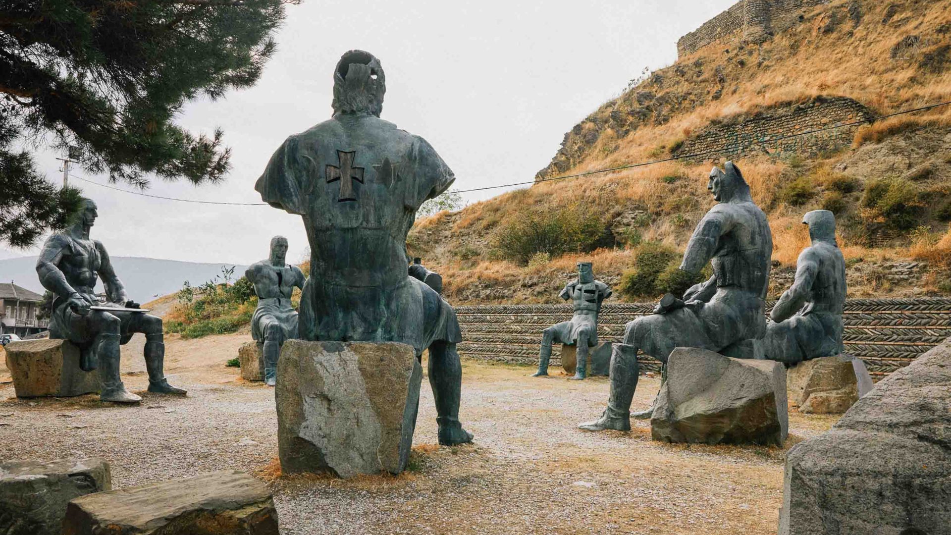 A monument to Stalin in a park.