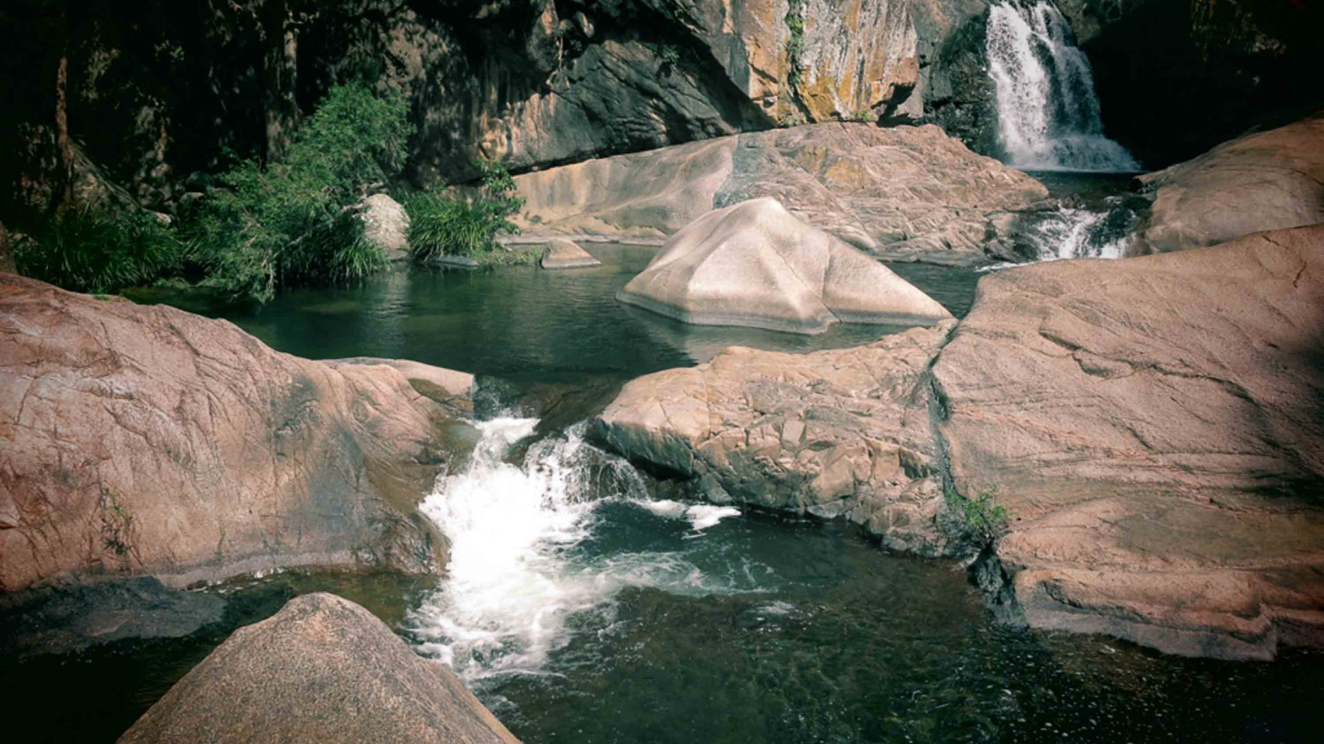 Rocks, river and a waterfall.