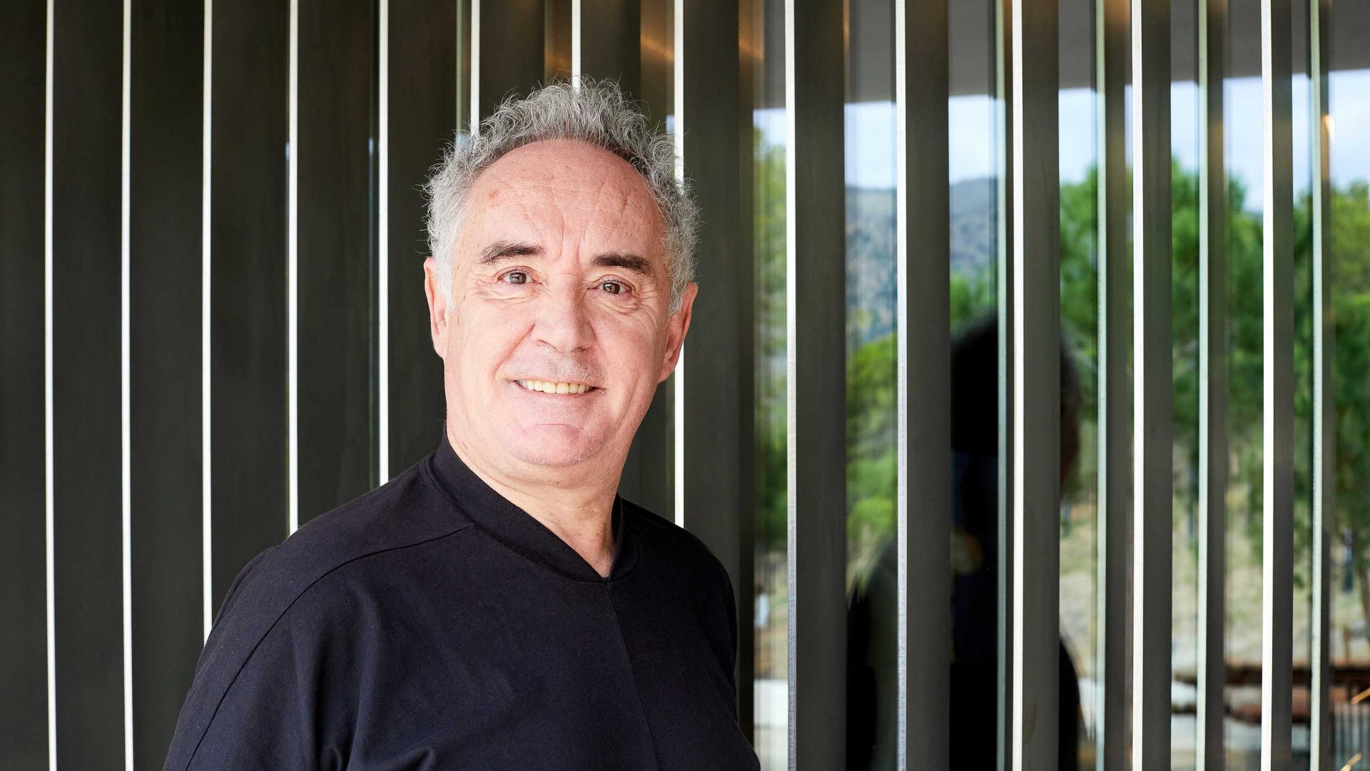 Chef Ferran Andria smiles to camera.