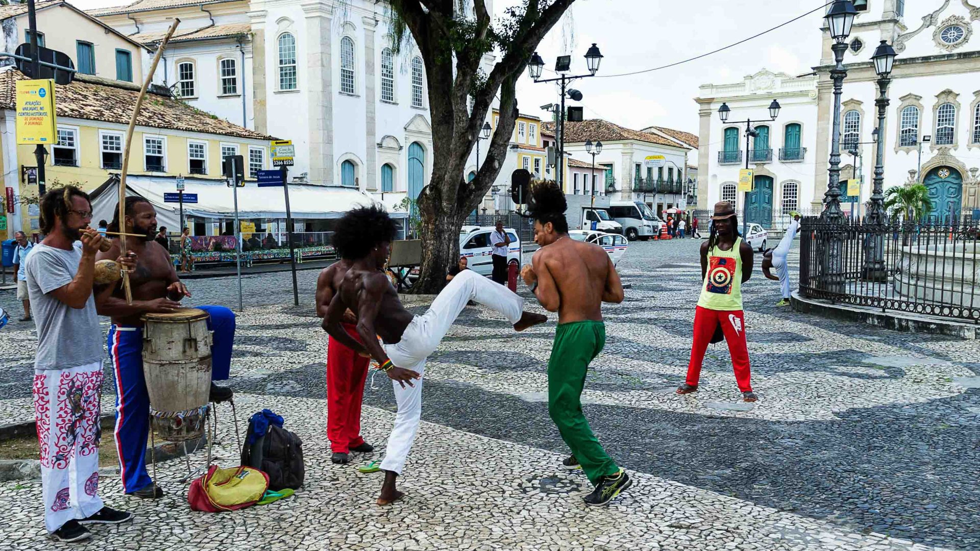 People take part in capoeira.