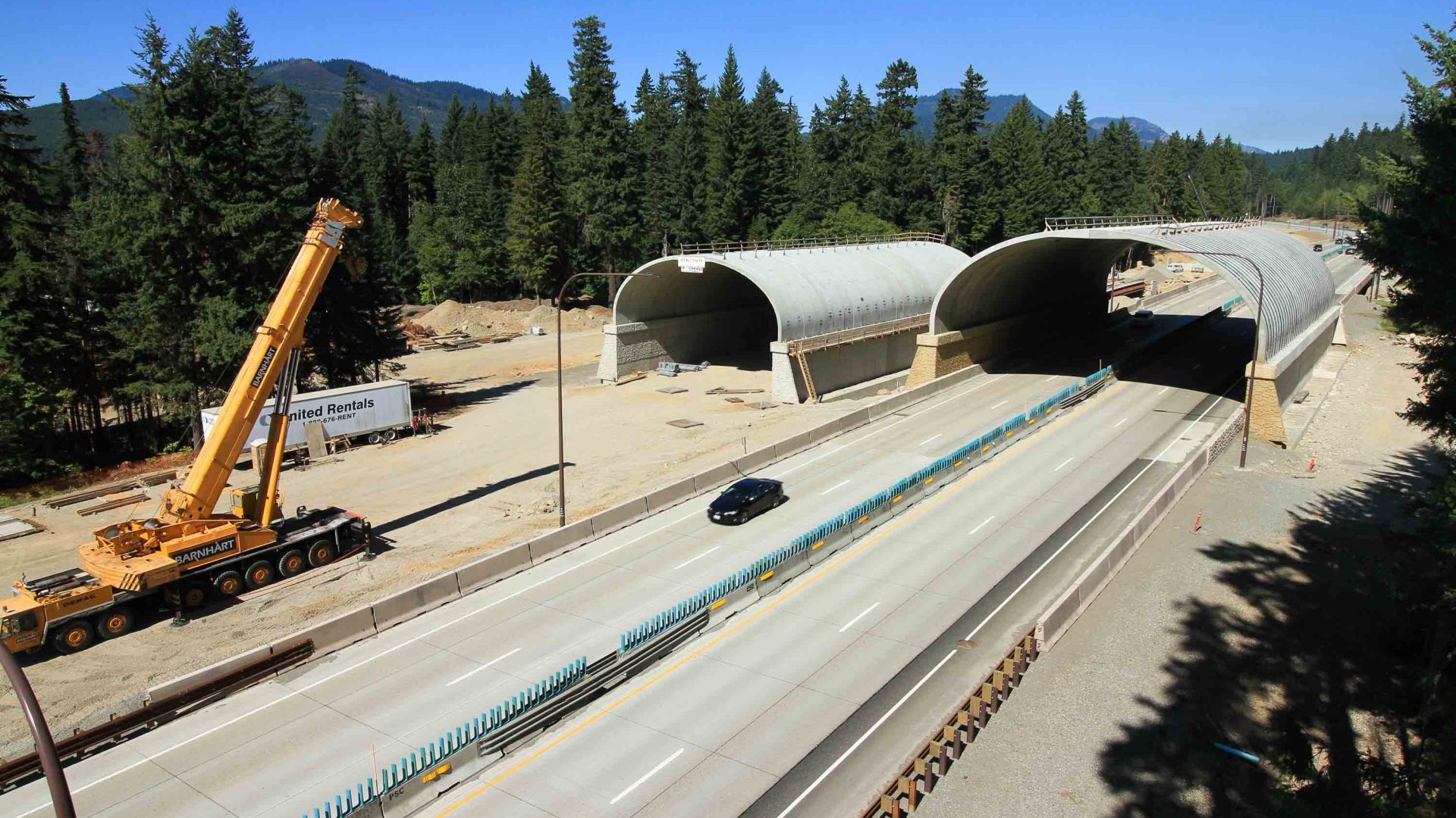 Crews build an overcrossing.